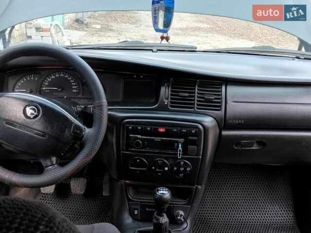 Синий Опель Вектра, объемом двигателя 1.8 л и пробегом 341 тыс. км за 2600 $, фото 5 на Automoto.ua
