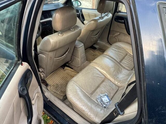 Синий Опель Вектра, объемом двигателя 2 л и пробегом 111 тыс. км за 1000 $, фото 3 на Automoto.ua