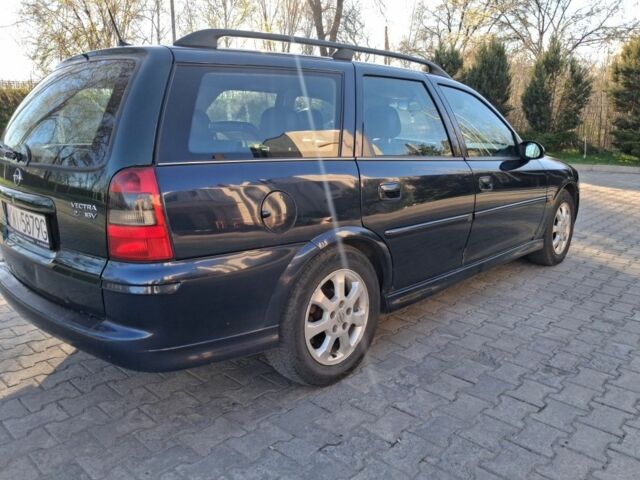 Синий Опель Вектра, объемом двигателя 2.2 л и пробегом 240 тыс. км за 2500 $, фото 3 на Automoto.ua