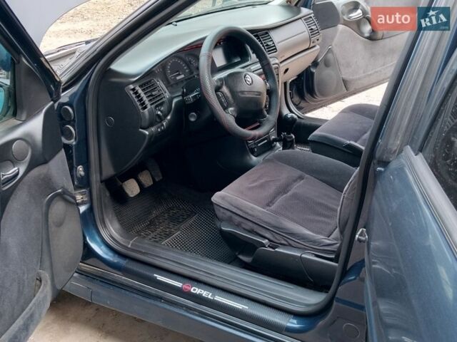 Синий Опель Вектра, объемом двигателя 1.8 л и пробегом 341 тыс. км за 2600 $, фото 7 на Automoto.ua
