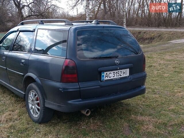 Синий Опель Вектра, объемом двигателя 1.8 л и пробегом 341 тыс. км за 2600 $, фото 12 на Automoto.ua