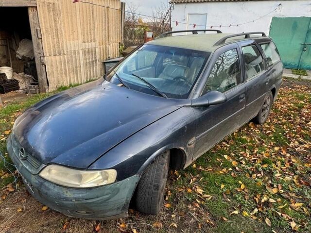 Синий Опель Вектра, объемом двигателя 2 л и пробегом 111 тыс. км за 1000 $, фото 1 на Automoto.ua