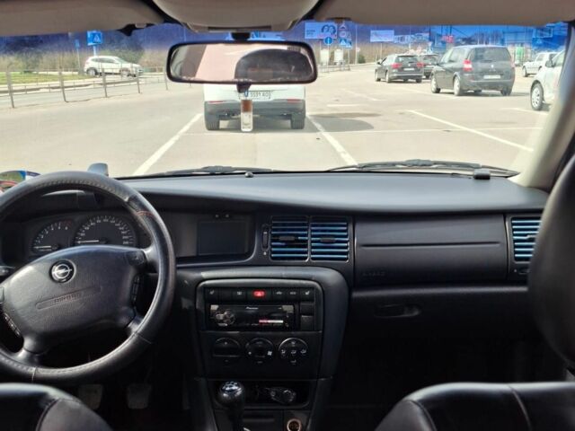 Синий Опель Вектра, объемом двигателя 2 л и пробегом 290 тыс. км за 1800 $, фото 9 на Automoto.ua