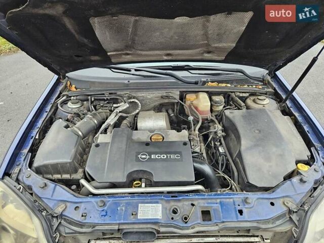 Синий Опель Вектра, объемом двигателя 2.17 л и пробегом 350 тыс. км за 3999 $, фото 32 на Automoto.ua