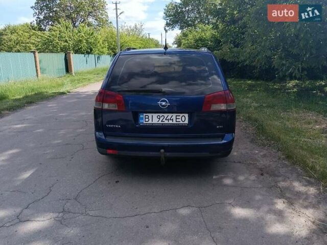 Синий Опель Вектра, объемом двигателя 2.2 л и пробегом 289 тыс. км за 3950 $, фото 2 на Automoto.ua