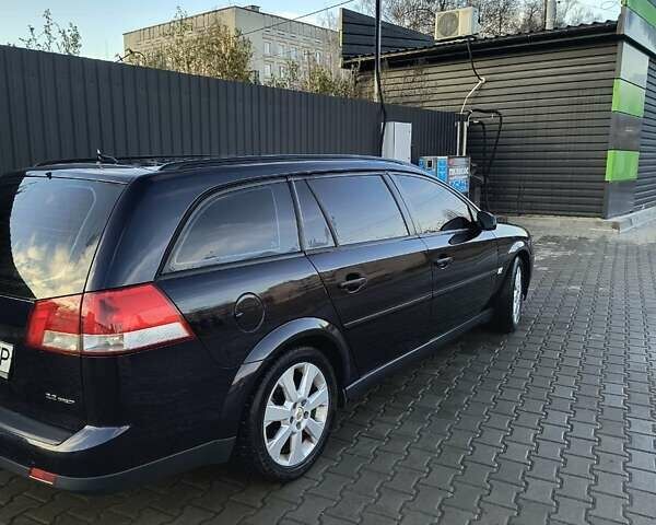 Синий Опель Вектра, объемом двигателя 2.2 л и пробегом 348 тыс. км за 4200 $, фото 3 на Automoto.ua