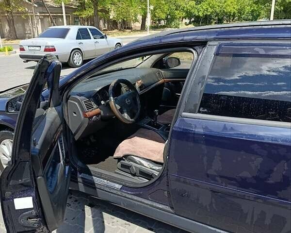 Синий Опель Вектра, объемом двигателя 2.02 л и пробегом 315 тыс. км за 4400 $, фото 8 на Automoto.ua