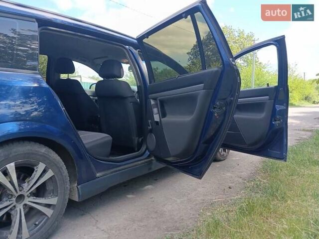 Синий Опель Вектра, объемом двигателя 2.2 л и пробегом 289 тыс. км за 3950 $, фото 4 на Automoto.ua