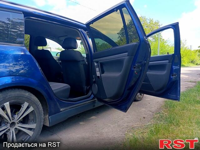 Синий Опель Вектра, объемом двигателя 22 л и пробегом 289 тыс. км за 3900 $, фото 2 на Automoto.ua