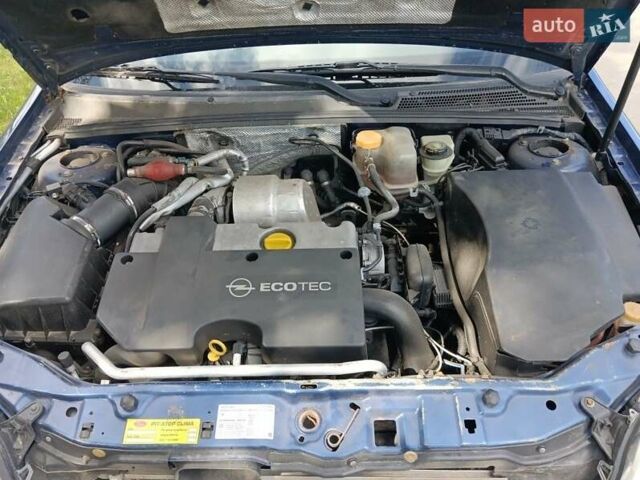 Синий Опель Вектра, объемом двигателя 2.2 л и пробегом 289 тыс. км за 3950 $, фото 3 на Automoto.ua