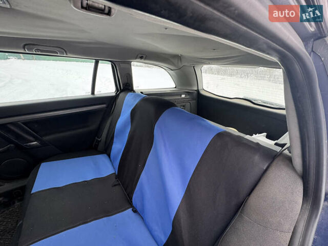 Синій Опель Вектра, об'ємом двигуна 2 л та пробігом 260 тис. км за 4000 $, фото 13 на Automoto.ua