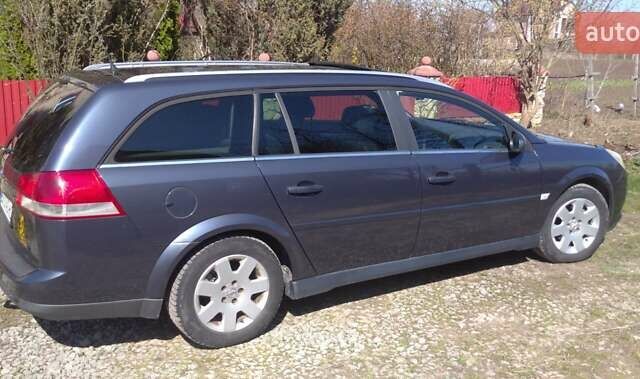 Синий Опель Вектра, объемом двигателя 1.91 л и пробегом 283 тыс. км за 5400 $, фото 2 на Automoto.ua