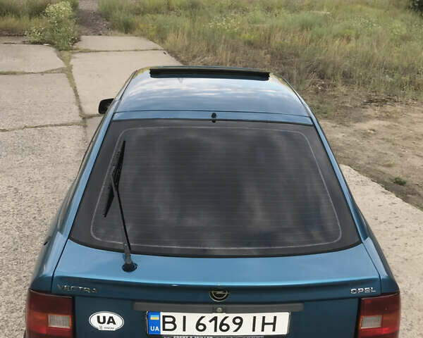 Синій Опель Вектра, об'ємом двигуна 2 л та пробігом 329 тис. км за 2350 $, фото 5 на Automoto.ua