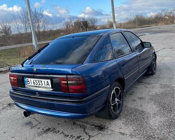 Синий Опель Вектра, объемом двигателя 2 л и пробегом 420 тыс. км за 2150 $, фото 3 на Automoto.ua