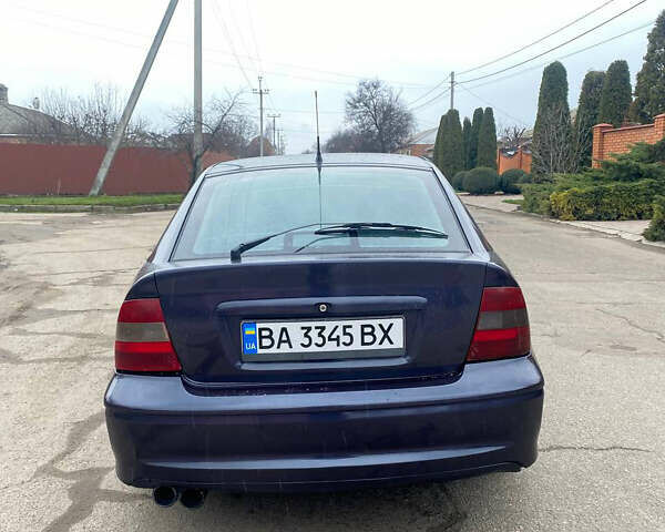 Синий Опель Вектра, объемом двигателя 1.8 л и пробегом 450 тыс. км за 1999 $, фото 7 на Automoto.ua