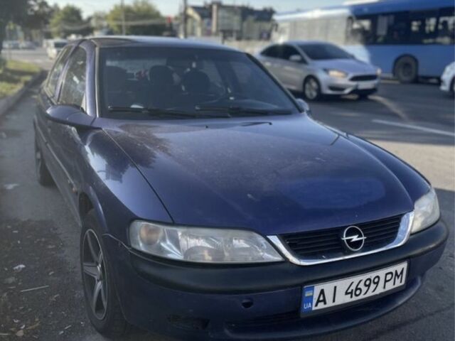 Синий Опель Вектра, объемом двигателя 1.8 л и пробегом 312 тыс. км за 1450 $, фото 4 на Automoto.ua