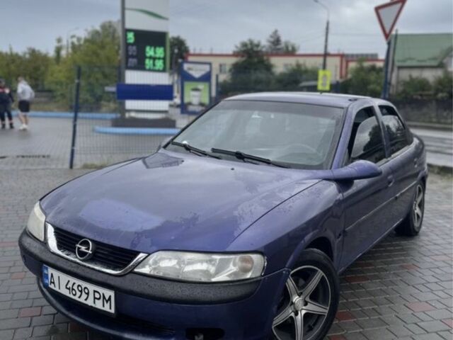 Синий Опель Вектра, объемом двигателя 1.8 л и пробегом 312 тыс. км за 1450 $, фото 3 на Automoto.ua