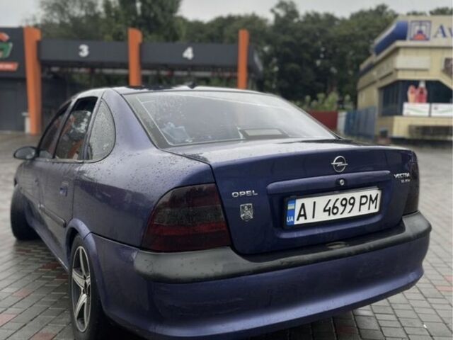 Синий Опель Вектра, объемом двигателя 1.8 л и пробегом 312 тыс. км за 1450 $, фото 1 на Automoto.ua