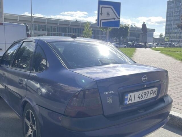 Синий Опель Вектра, объемом двигателя 1.8 л и пробегом 312 тыс. км за 1450 $, фото 2 на Automoto.ua