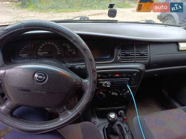 Синий Опель Вектра, объемом двигателя 1.79 л и пробегом 274 тыс. км за 1600 $, фото 14 на Automoto.ua