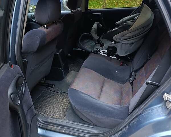 Синий Опель Вектра, объемом двигателя 1.79 л и пробегом 274 тыс. км за 1600 $, фото 11 на Automoto.ua