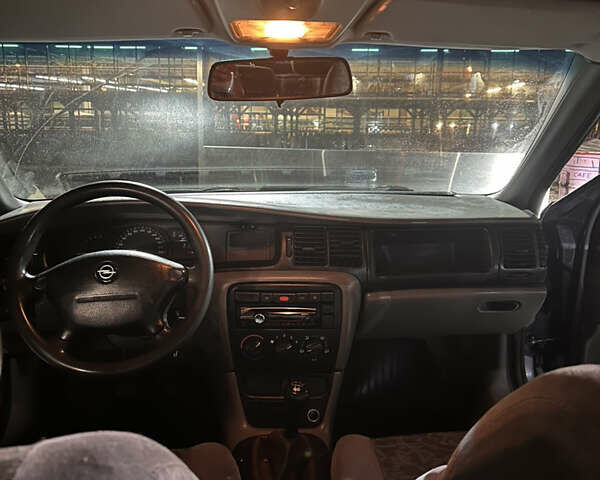 Синий Опель Вектра, объемом двигателя 1.8 л и пробегом 260 тыс. км за 2838 $, фото 3 на Automoto.ua