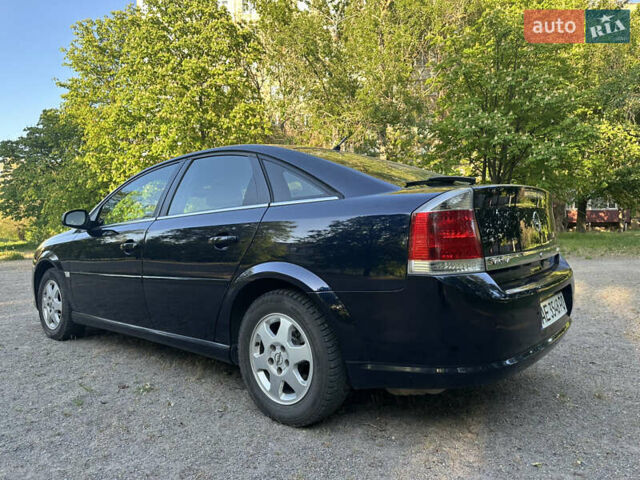 Синий Опель Вектра, объемом двигателя 2.2 л и пробегом 260 тыс. км за 5800 $, фото 4 на Automoto.ua