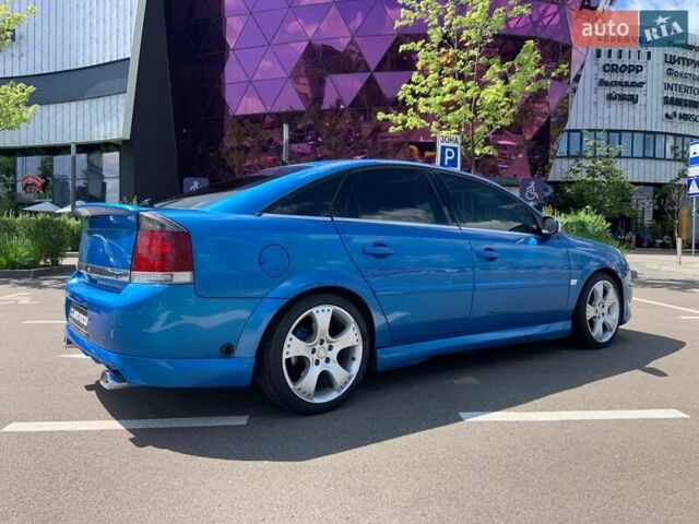 Синій Опель Вектра, об'ємом двигуна 2.79 л та пробігом 250 тис. км за 9290 $, фото 4 на Automoto.ua