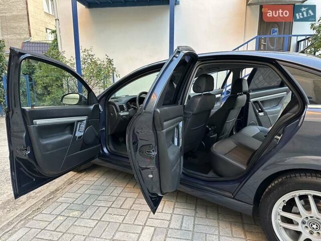 Синій Опель Вектра, об'ємом двигуна 1.91 л та пробігом 236 тис. км за 6350 $, фото 42 на Automoto.ua
