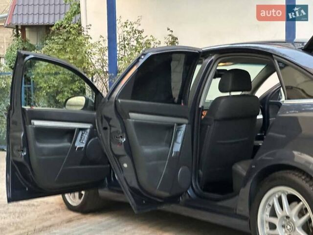 Синій Опель Вектра, об'ємом двигуна 1.91 л та пробігом 236 тис. км за 6350 $, фото 31 на Automoto.ua
