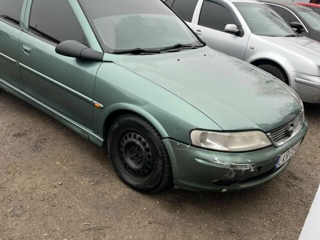 Зеленый Опель Вектра, объемом двигателя 2 л и пробегом 290 тыс. км за 1300 $, фото 1 на Automoto.ua