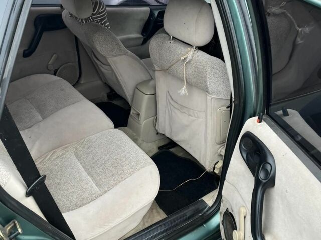 Зеленый Опель Вектра, объемом двигателя 2 л и пробегом 290 тыс. км за 1300 $, фото 6 на Automoto.ua