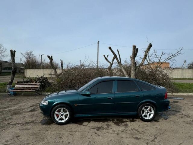 Зелений Опель Вектра, об'ємом двигуна 2 л та пробігом 260 тис. км за 3300 $, фото 2 на Automoto.ua