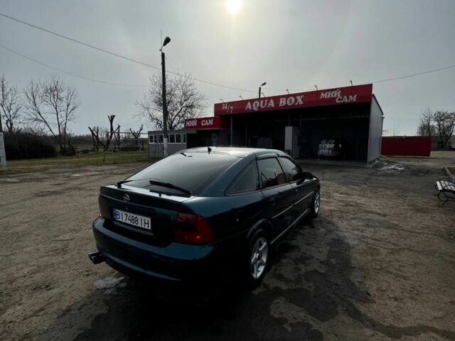Зелений Опель Вектра, об'ємом двигуна 2 л та пробігом 260 тис. км за 3300 $, фото 3 на Automoto.ua