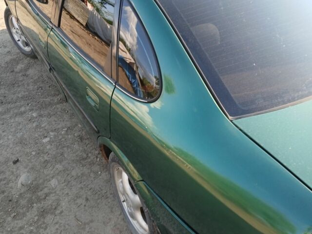 Зелений Опель Вектра, об'ємом двигуна 1.8 л та пробігом 250 тис. км за 1500 $, фото 6 на Automoto.ua