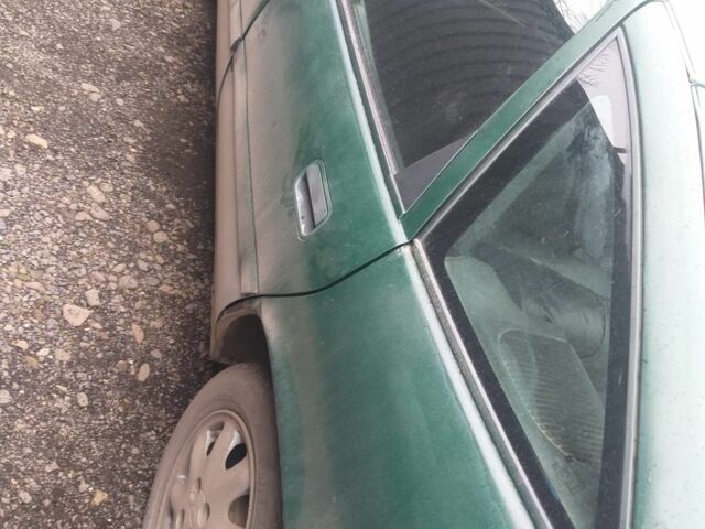 Зеленый Опель Вектра, объемом двигателя 2 л и пробегом 80 тыс. км за 663 $, фото 4 на Automoto.ua