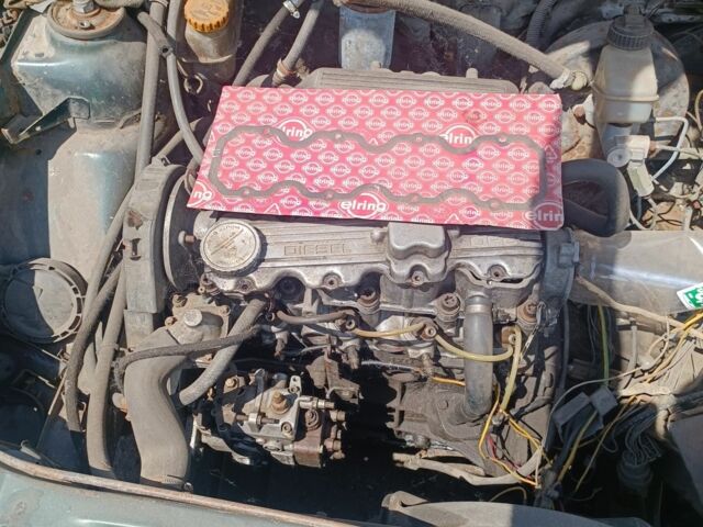 Зеленый Опель Вектра, объемом двигателя 1 л и пробегом 200 тыс. км за 250 $, фото 2 на Automoto.ua