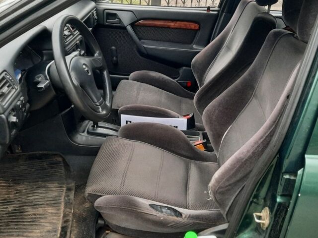 Зеленый Опель Вектра, объемом двигателя 2 л и пробегом 265 тыс. км за 1400 $, фото 2 на Automoto.ua