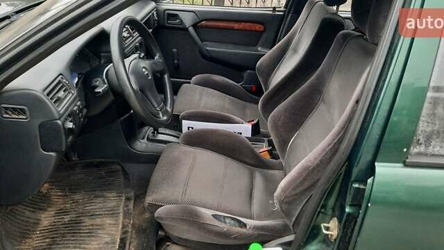 Зелений Опель Вектра, об'ємом двигуна 2 л та пробігом 263 тис. км за 1300 $, фото 6 на Automoto.ua