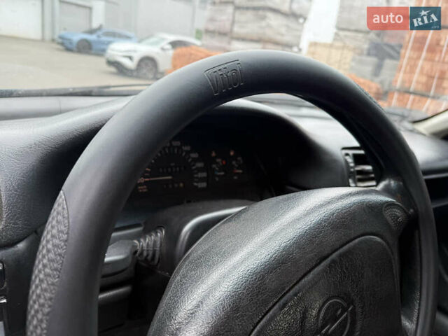 Зеленый Опель Вектра, объемом двигателя 2 л и пробегом 400 тыс. км за 1350 $, фото 11 на Automoto.ua