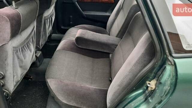 Зелений Опель Вектра, об'ємом двигуна 2 л та пробігом 263 тис. км за 1300 $, фото 7 на Automoto.ua