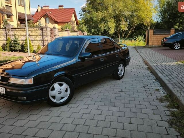 Зелений Опель Вектра, об'ємом двигуна 2 л та пробігом 376 тис. км за 1999 $, фото 46 на Automoto.ua