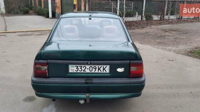 Зелений Опель Вектра, об'ємом двигуна 2 л та пробігом 263 тис. км за 1300 $, фото 5 на Automoto.ua