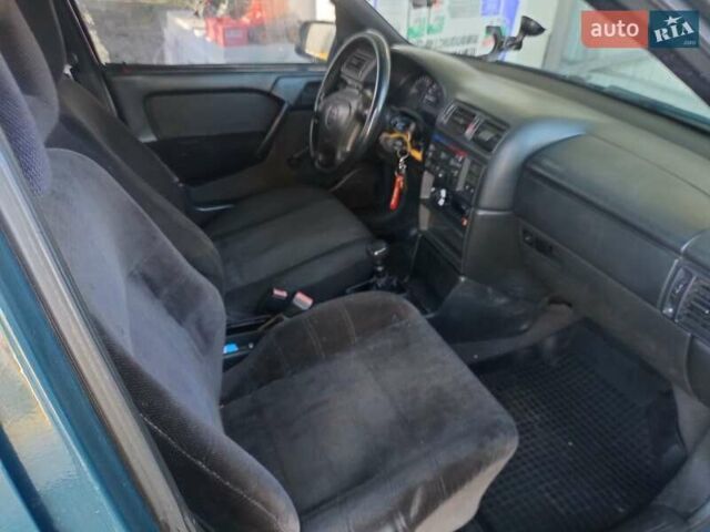 Зеленый Опель Вектра, объемом двигателя 1.6 л и пробегом 412 тыс. км за 1800 $, фото 4 на Automoto.ua