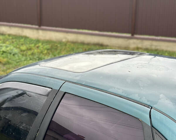 Зеленый Опель Вектра, объемом двигателя 1.8 л и пробегом 309 тыс. км за 999 $, фото 13 на Automoto.ua