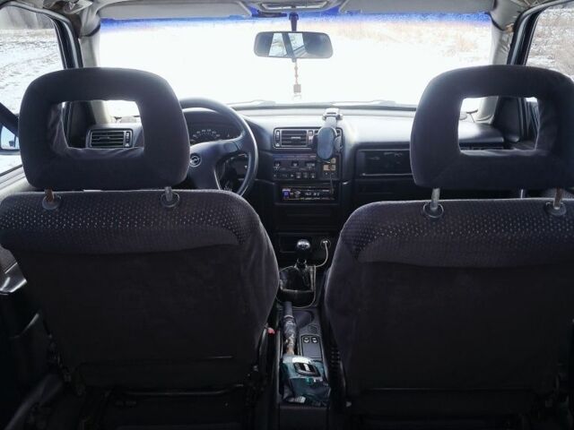 Зеленый Опель Вектра, объемом двигателя 2 л и пробегом 408 тыс. км за 1300 $, фото 11 на Automoto.ua