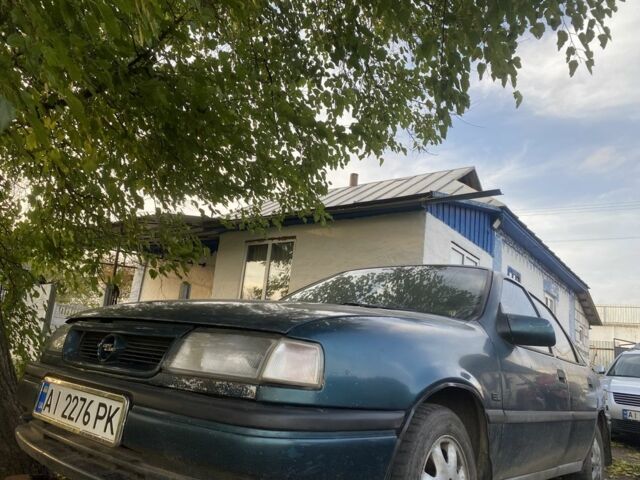 Зеленый Опель Вектра, объемом двигателя 1.6 л и пробегом 395 тыс. км за 950 $, фото 1 на Automoto.ua