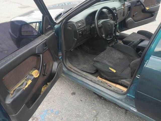 Зеленый Опель Вектра, объемом двигателя 2 л и пробегом 123 тыс. км за 1200 $, фото 4 на Automoto.ua
