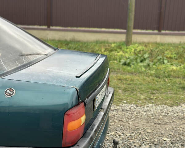 Зеленый Опель Вектра, объемом двигателя 1.8 л и пробегом 309 тыс. км за 999 $, фото 12 на Automoto.ua