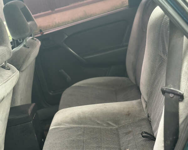 Зеленый Опель Вектра, объемом двигателя 1.8 л и пробегом 309 тыс. км за 999 $, фото 18 на Automoto.ua